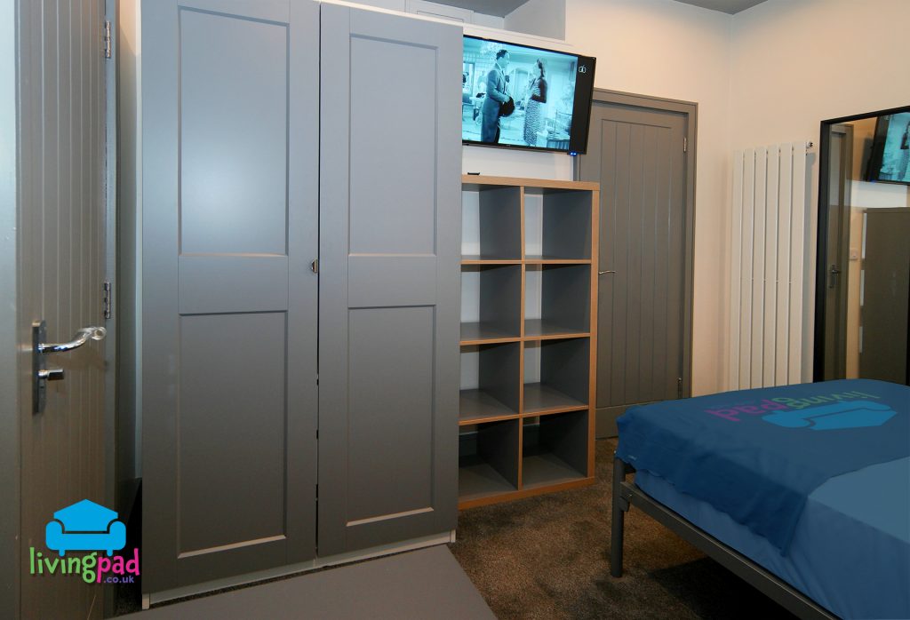 Bedroom 1 storage & 40" smart tv