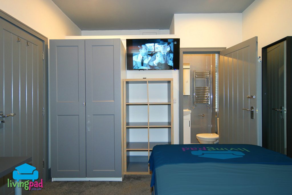 Bedroom 1 with over en suite storage