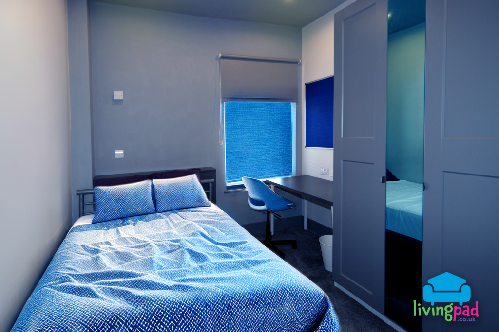 Bedroom 3 bed, wardrobe and work area